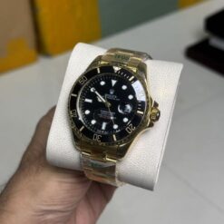 rolex submariner golden black dial